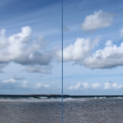 Ein Blick übers Meer, unten Wasser und Wellen, am Horizont eine andere Insel (Sylt), darüber ein blauer Himmel mit Wolken. Das Bild ist in der Mitte unterteilt, links ist es verschwommen, rechts ganz scharf. Foto: Birte Vogel